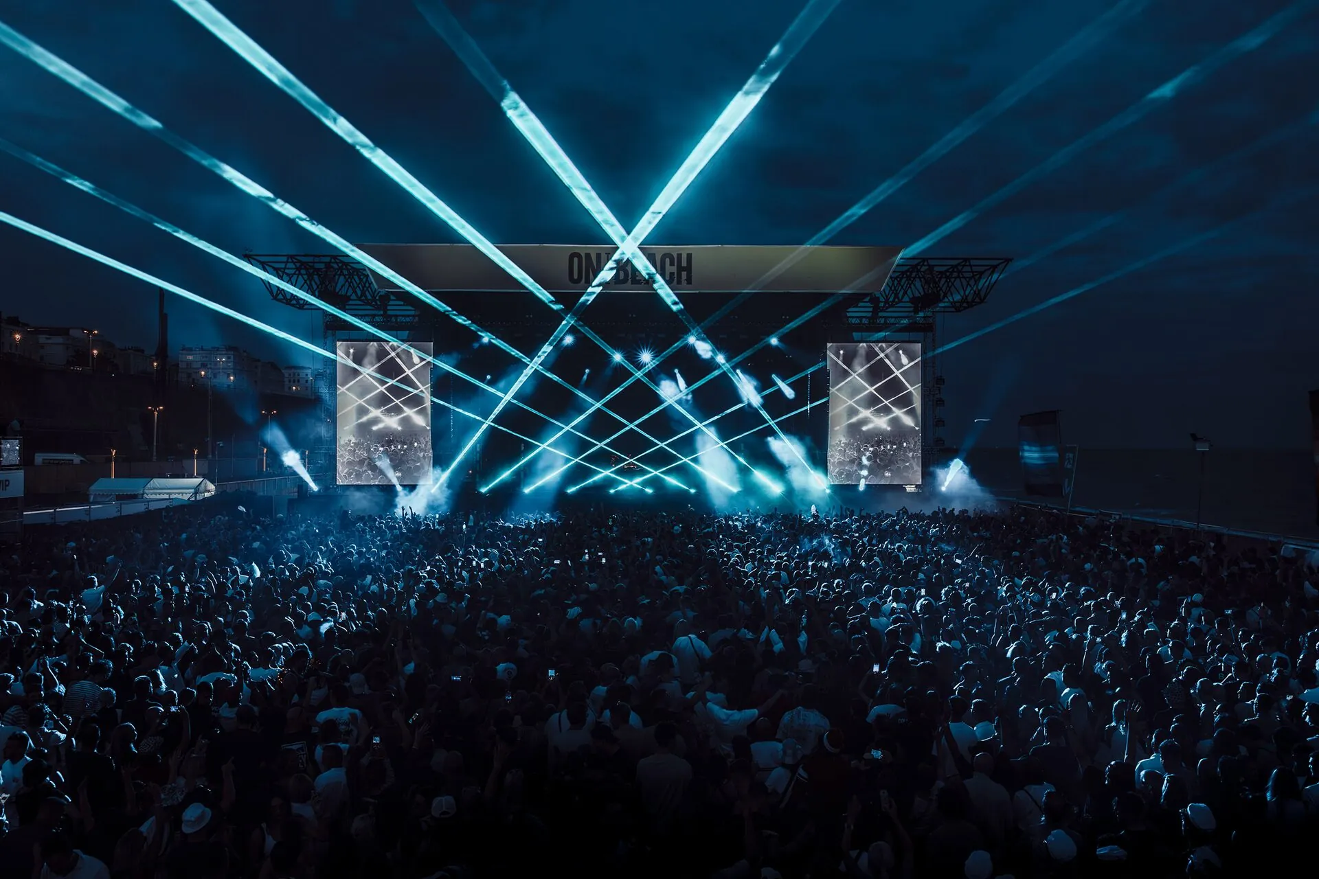 Friends enjoying On The Beach Brighton festival